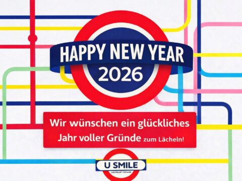 Buntes Neujahrsmotiv im London-Tube-Stil mit Logo und Wunsch für ein glückliches Jahr 2026 voller Gründe zum Lächeln.
